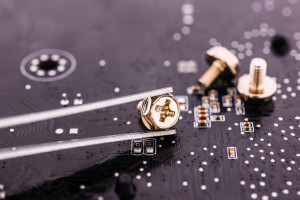 Computer repair, installation motherboard with screws